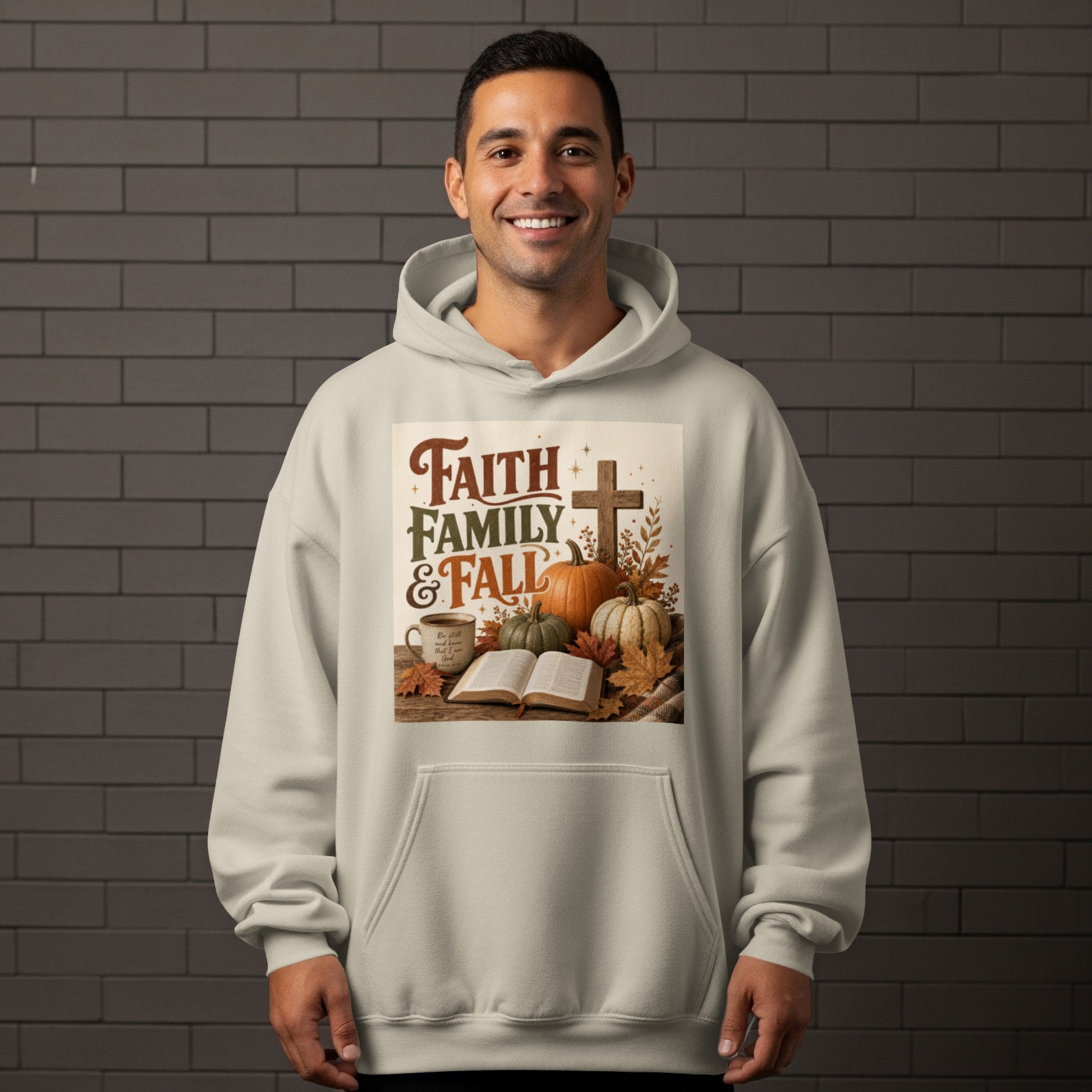 Light beige hoodie with "Faith Family & Fall" graphic featuring pumpkins, a cross, and a Bible.