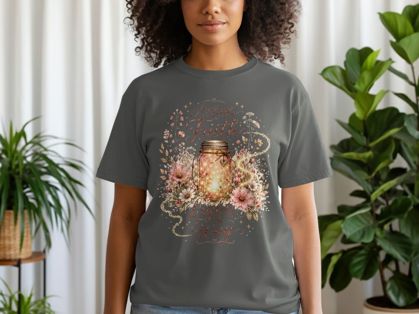 Gray t-shirt with a floral design featuring a mason jar filled with lights.