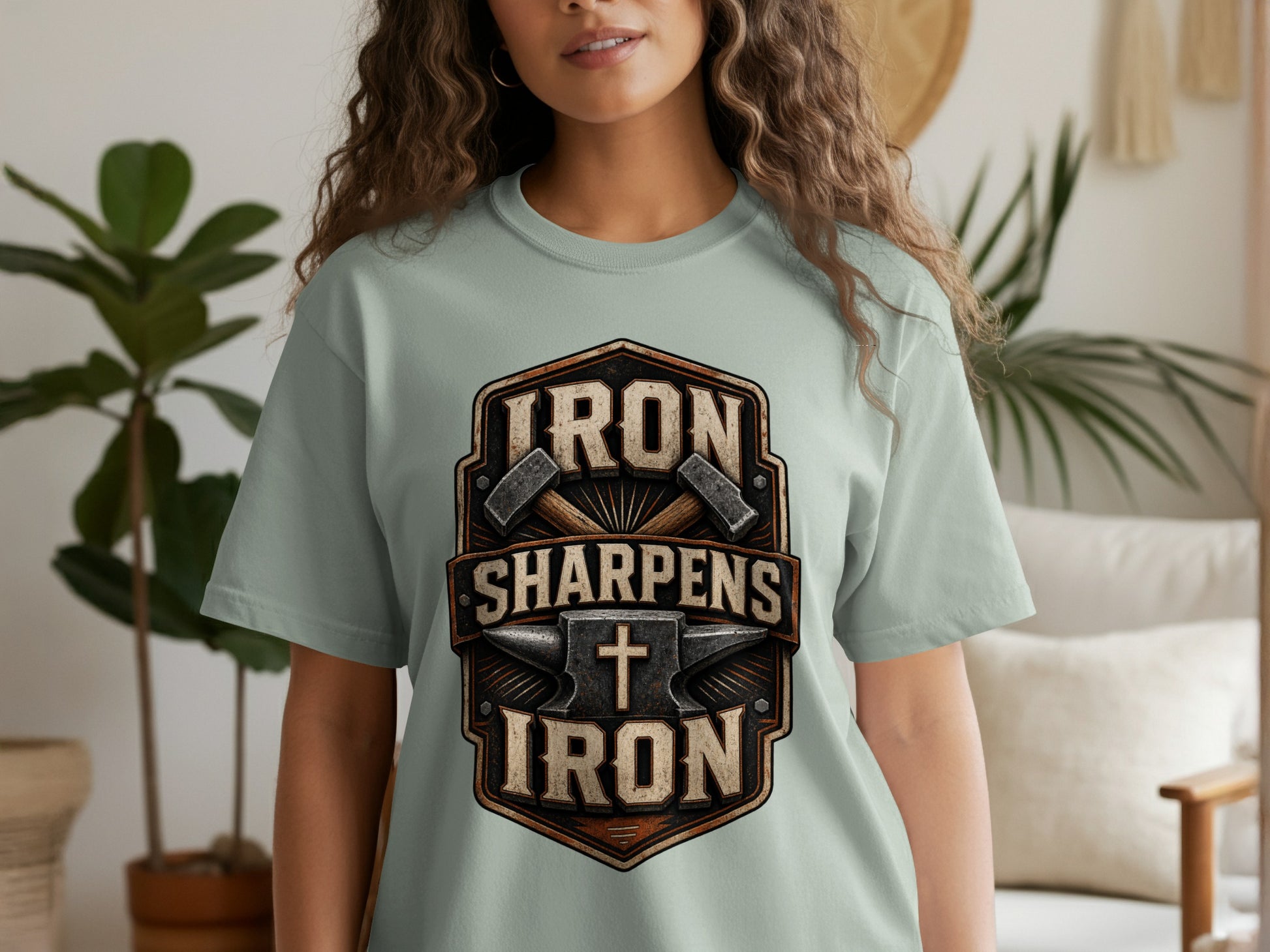 Light blue t-shirt with "IRON SHARPENS IRON" text and anvil graphic.