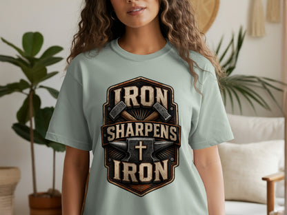Light blue t-shirt with "IRON SHARPENS IRON" text and anvil graphic.
