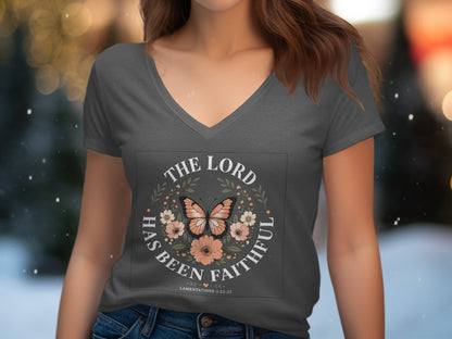 Dark grey V-neck t-shirt with floral wreath, butterfly, and "The Lord has been faithful" text.