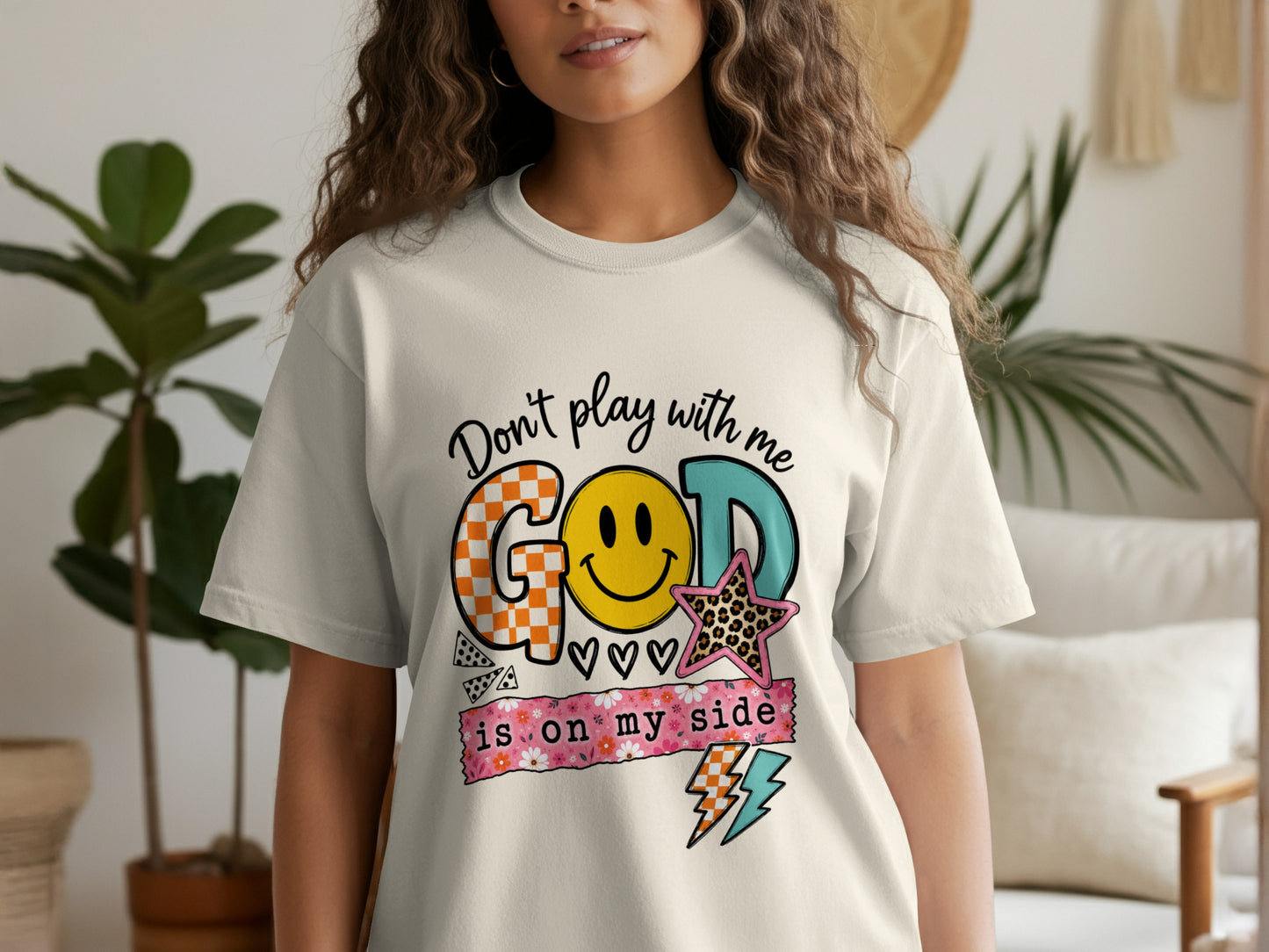 Cream t-shirt with graphic text "Don't play with me GOD is on my side".
