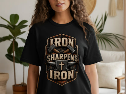 Black t-shirt with shield graphic: "Iron Sharpens Iron" and blacksmithing tools.