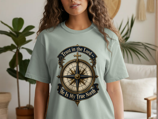 Light green t-shirt with a compass design and text "Trust in the Lord - He Is My True North".