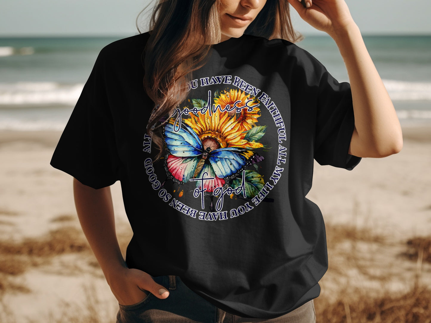 Black t-shirt with butterfly, sunflower, and patriotic text graphic.