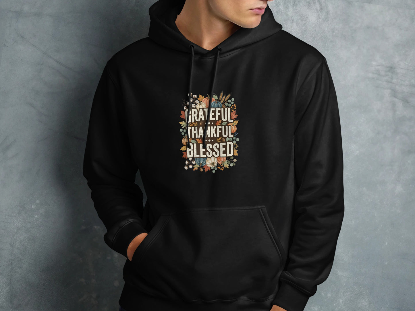 Black hoodie with "Grateful Thankful Blessed" text and floral accents.