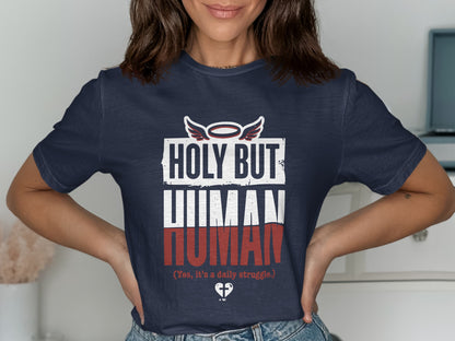 Navy t-shirt with "Holy but Human" and "Yes, it's a daily struggle" text.