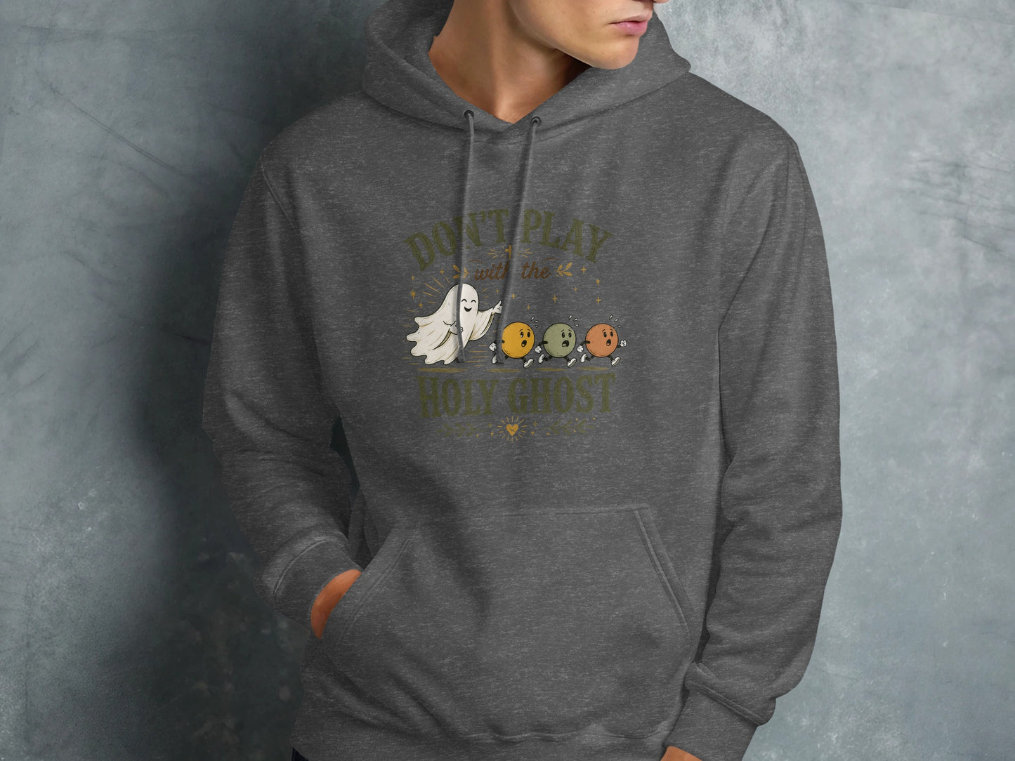 Dark grey hoodie with ghost and balls graphic and text "DON'T PLAY WITH THE HOLY GHOST".