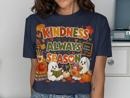 "Kindness is Always in Season" graphic with two ghosts, books, pumpkins, and autumn leaves.
