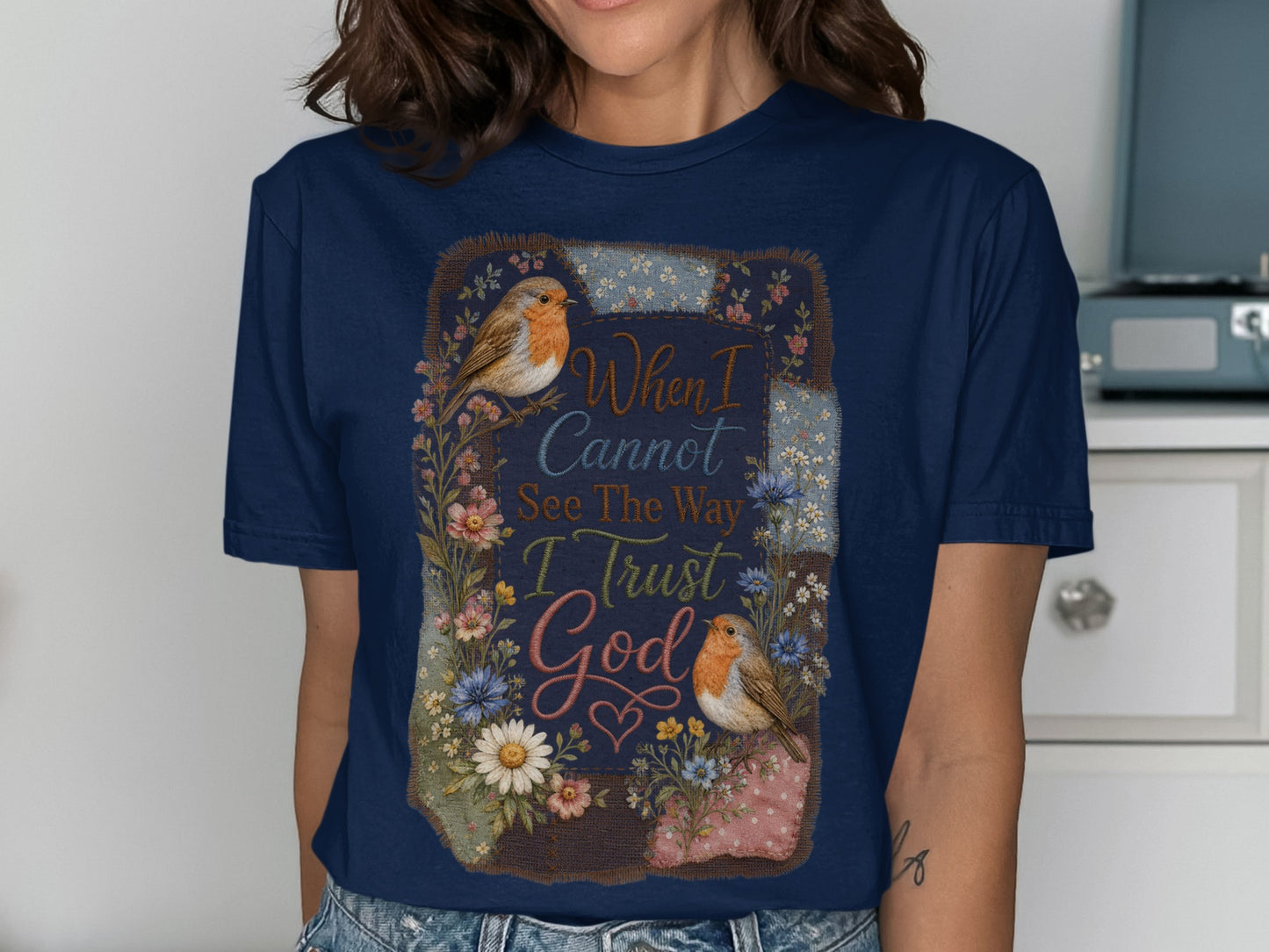 Navy t-shirt with birds and flowers, "When I Cannot See The Way I Trust God".