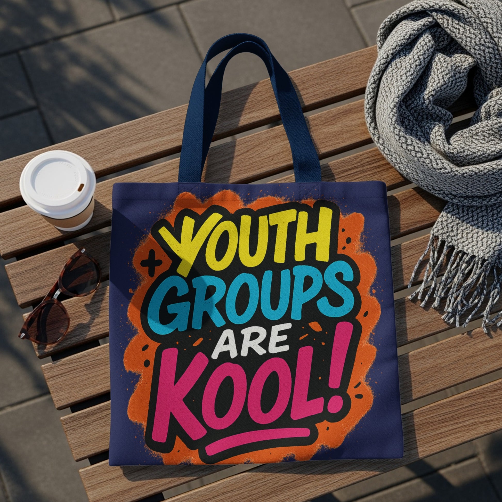 Navy blue tote bag with "YOUTH GROUPS ARE KOOL!" in colorful graffiti-style lettering.