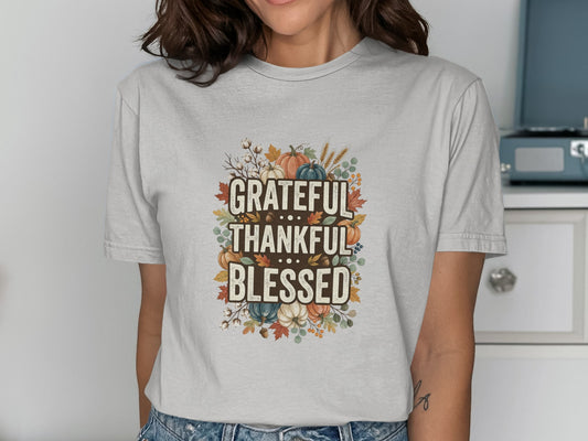T-shirt with "Grateful Thankful Blessed" text and autumn leaves graphic.
