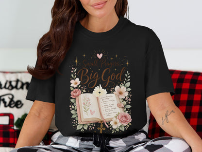 Black t-shirt with "Small Prayers, Big God" text and open prayer book design.