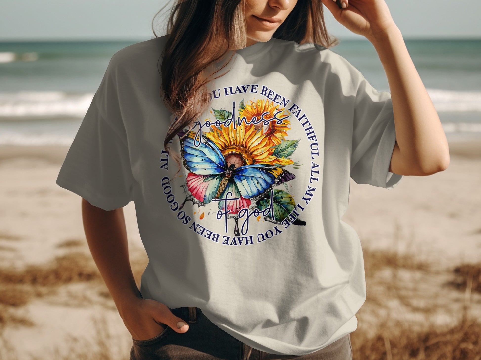 T-shirt with butterfly, sunflower, and text "Goodness you have been so faithful all my life".