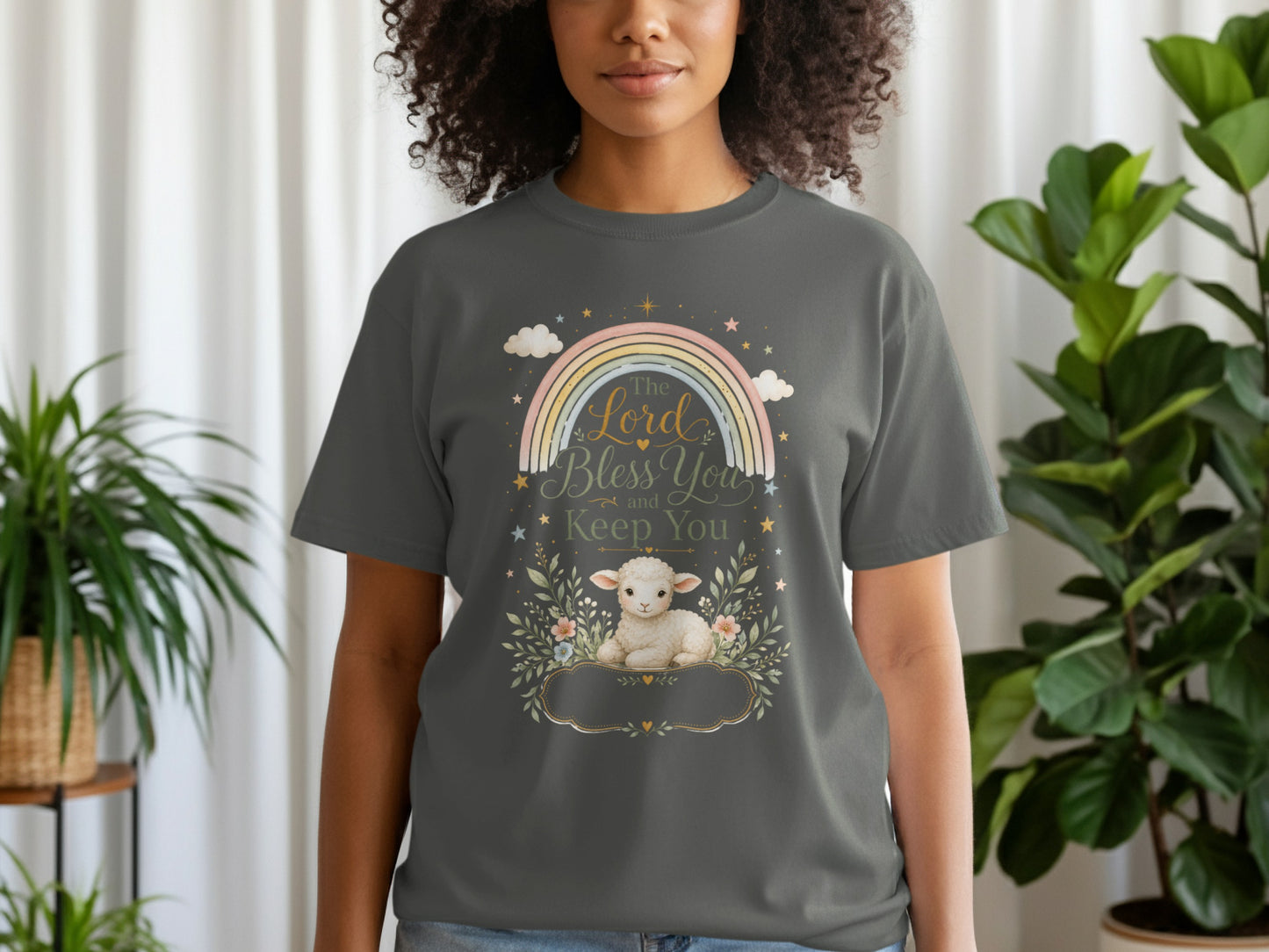 Gray t-shirt with a lamb and rainbow graphic saying "The Lord Bless You and Keep You."