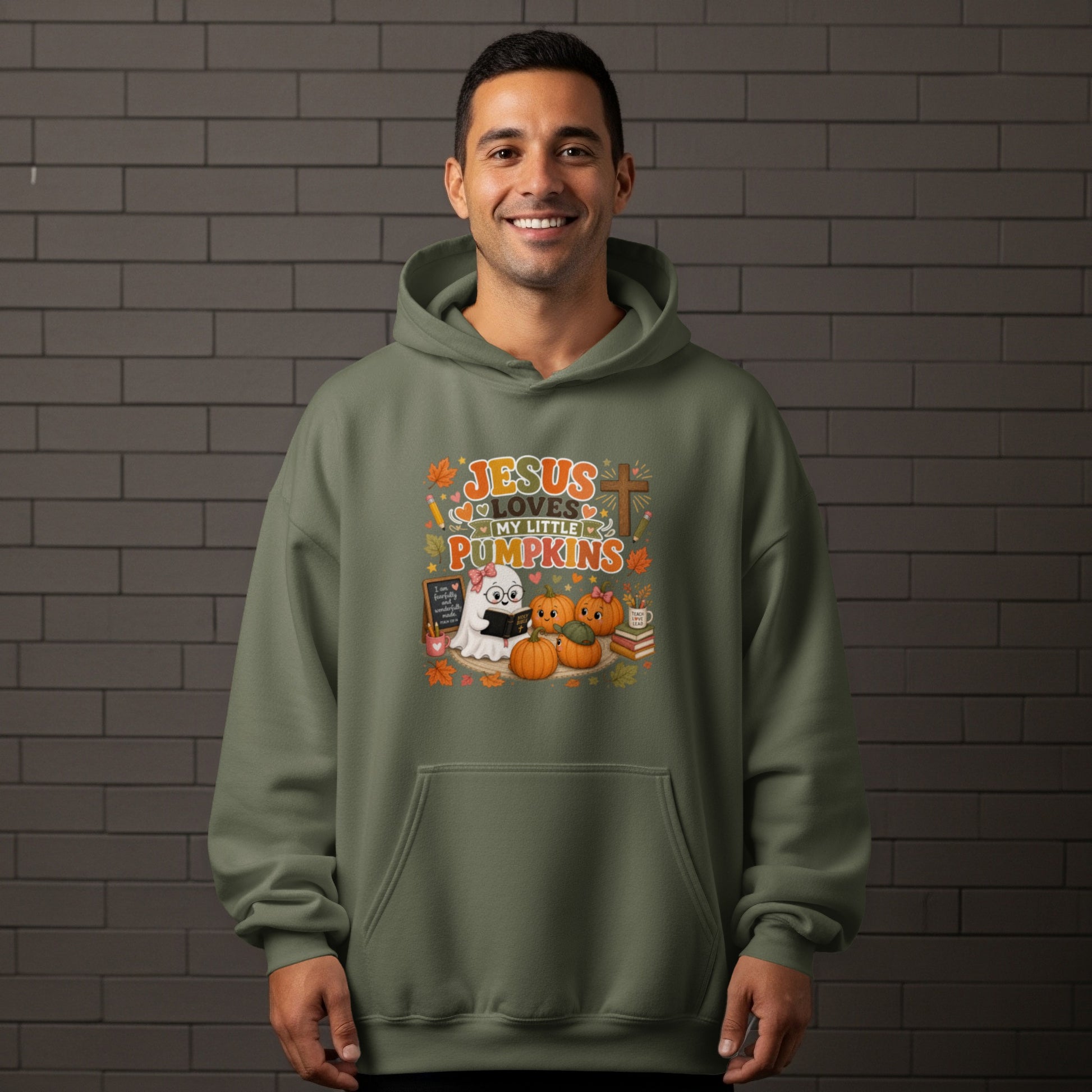 Green hoodie with "Jesus Loves My Little Pumpkins" text and autumn graphics.