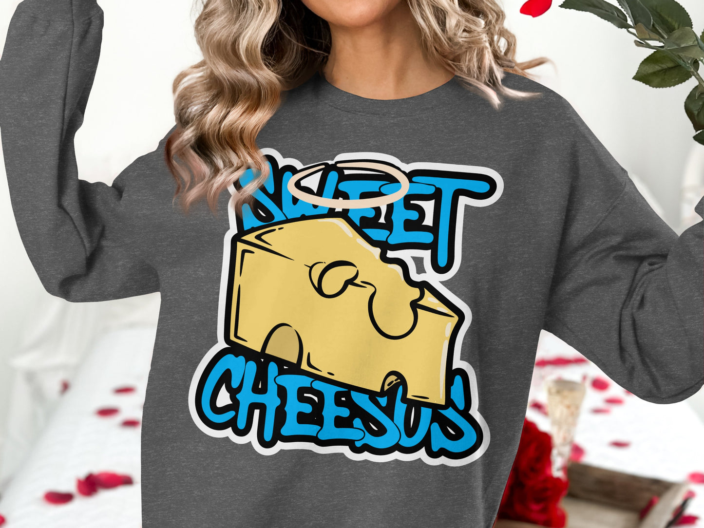 Dark gray sweatshirt with "SWEET CHEESUS" and a cheese slice graphic.