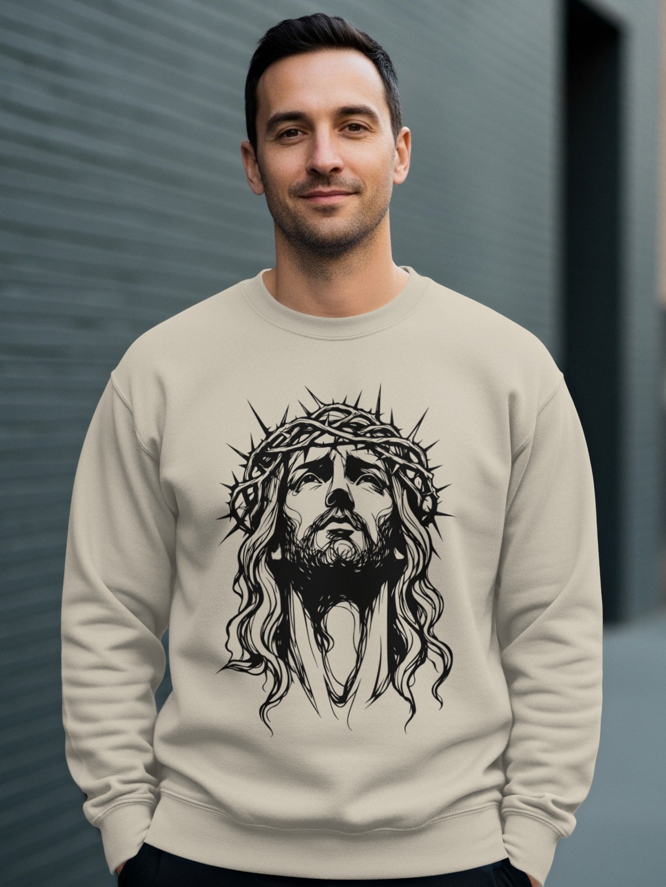 Crewneck sweatshirt with a black line drawing of Jesus wearing a crown of thorns.