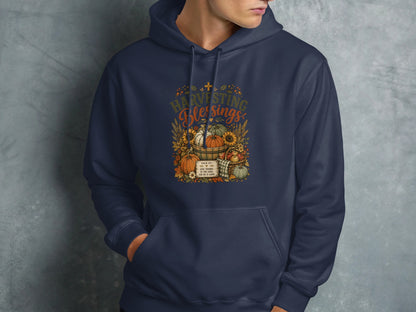 Navy hoodie with "Harvesting Blessings" text and Psalm 107:1 scripture.