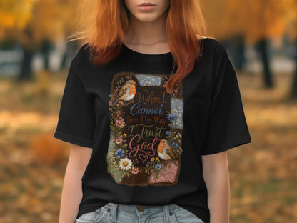 Black t-shirt with birds, flowers, and "When I cannot see the way, I trust God."