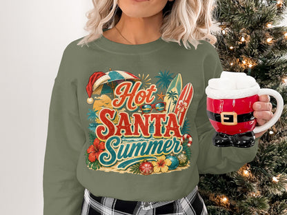 Woman in olive green sweatshirt with "Hot Santa Summer" beach graphic.