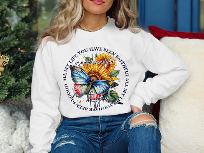 White sweatshirt with butterfly, sunflowers, and text "God all my life you have been so good, faithful all my life you have been".