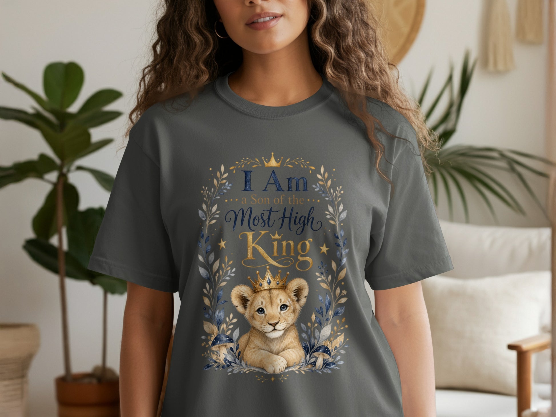 Dark gray t-shirt with a baby lion wearing a crown and the text "I Am a Son of the Most High King".