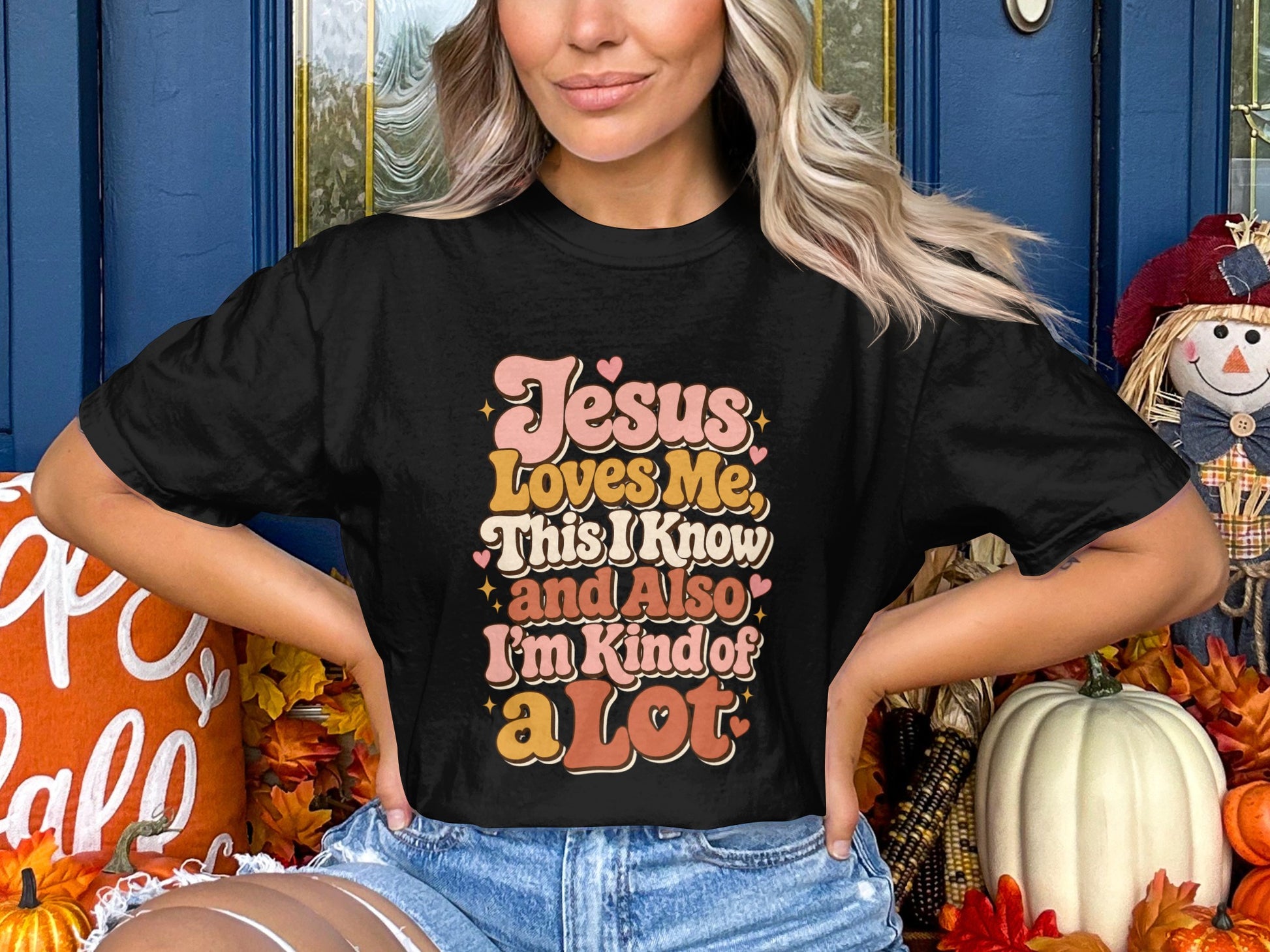 Black t-shirt with "Jesus Loves Me, This I Know and Also I'm Kind of a Lot" text.