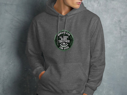Dark grey hooded sweatshirt with "Romans 8:28" and Christian cross graphic.