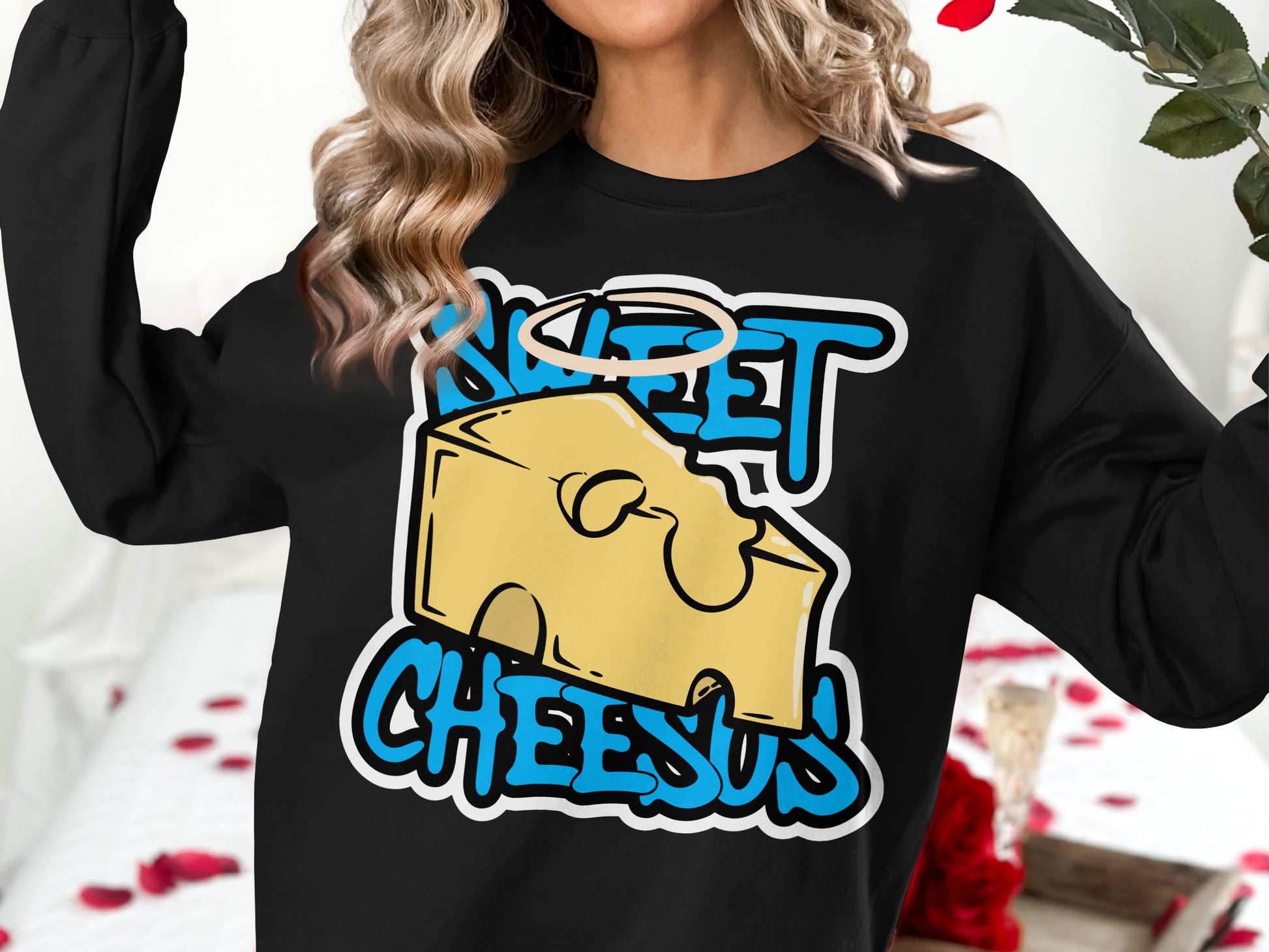 Black sweatshirt with "Sweet Cheesus" text and a cheese graphic.