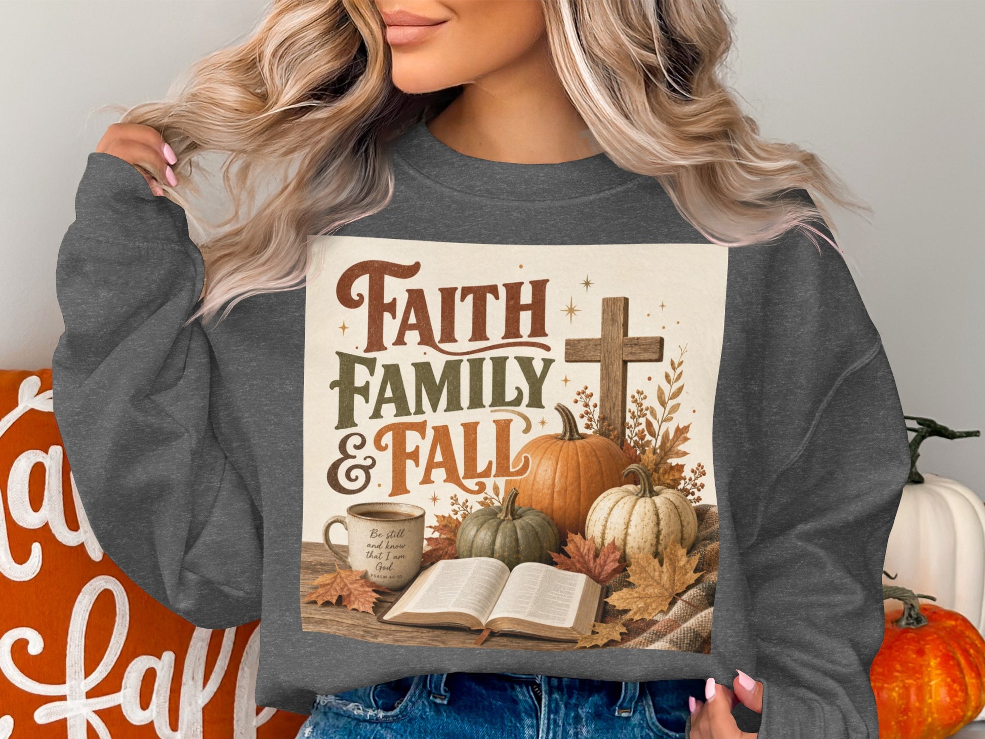 Sweatshirt with "Faith Family & Fall" text, pumpkins, bible, and cross design.