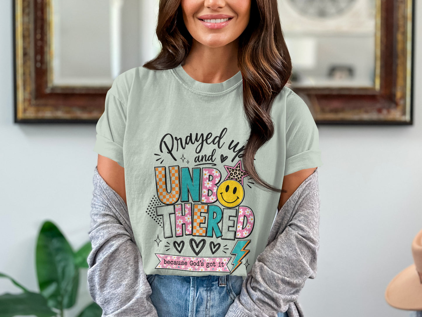 Mint t-shirt with "Prayed up and UNBOUND THERED because God's got it" graphic.