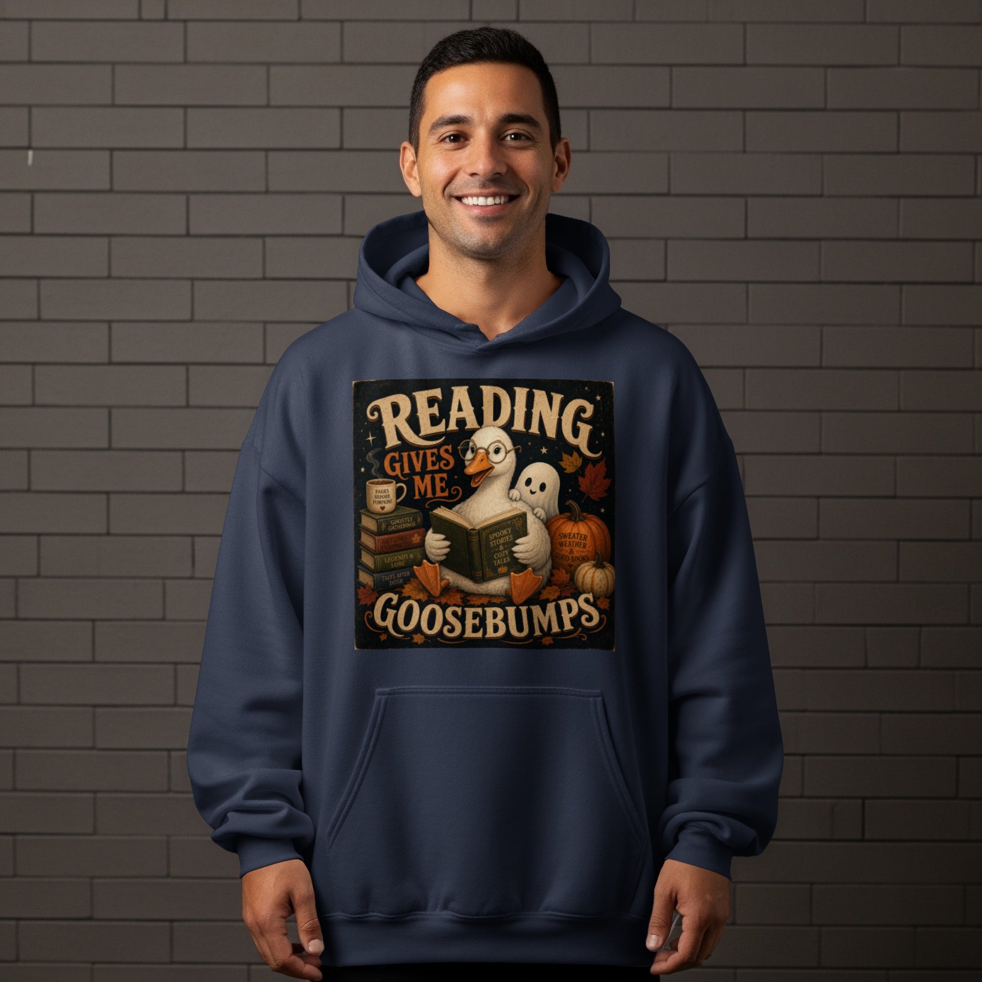 Goose wearing glasses reads a book with a ghost and pumpkins, text says "Reading Gives Me Goosebumps".