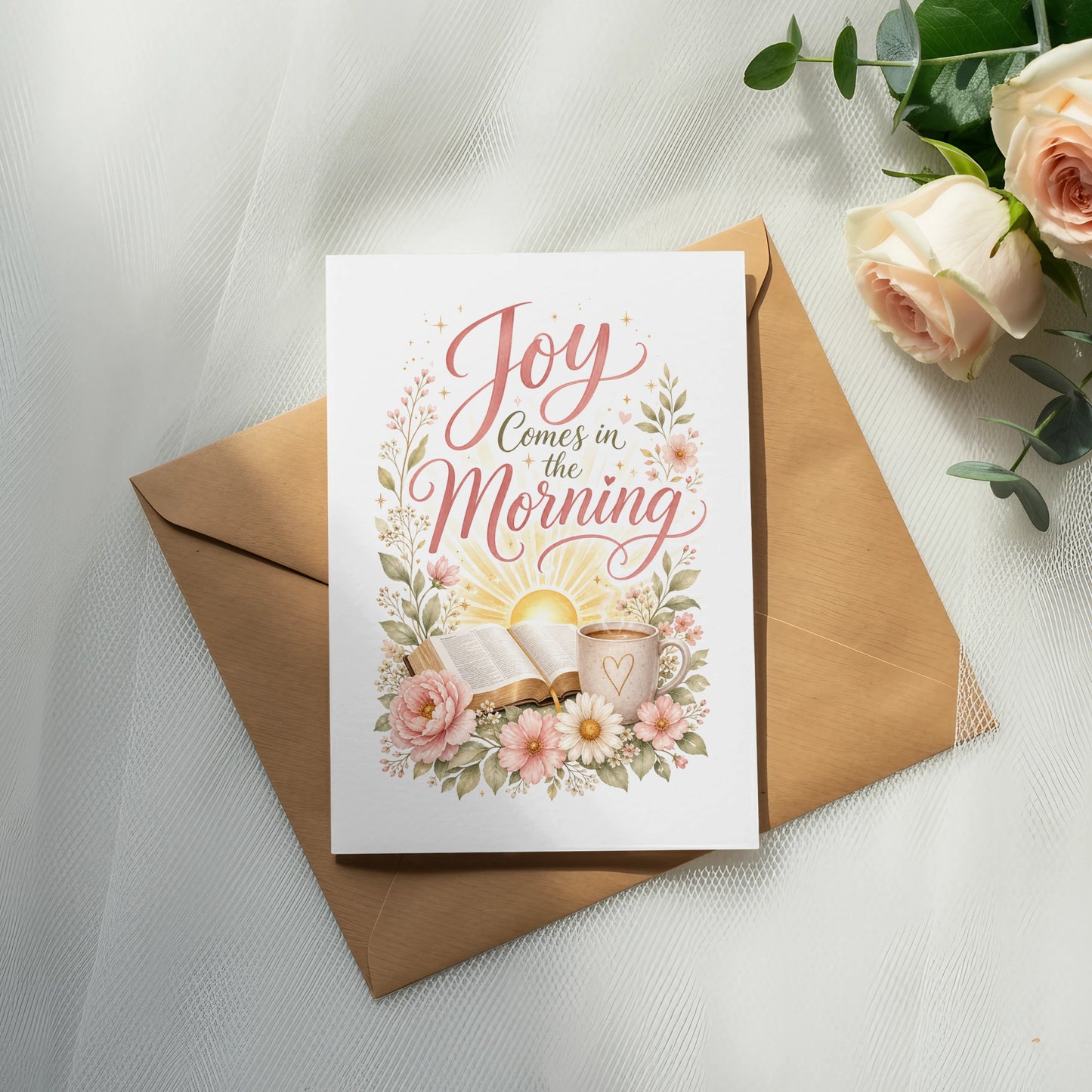 Card with "Joy Comes in the Morning" text, an open book, and coffee.