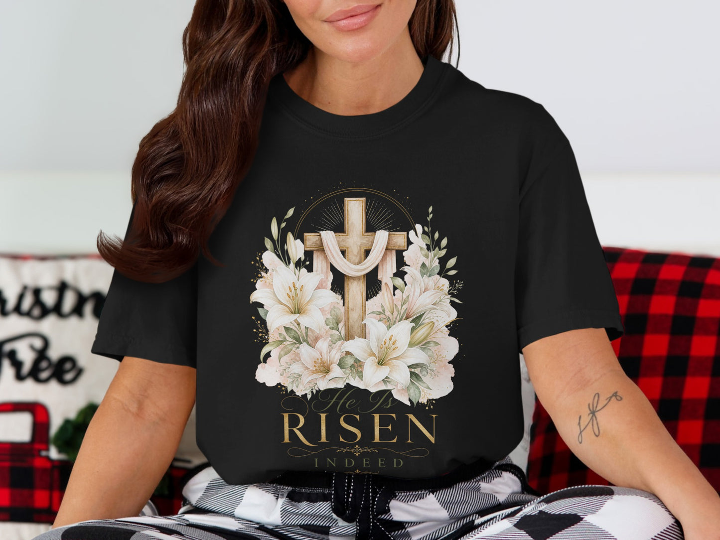 Black t-shirt with a wooden cross, lilies, and "He Is Risen Indeed" text.