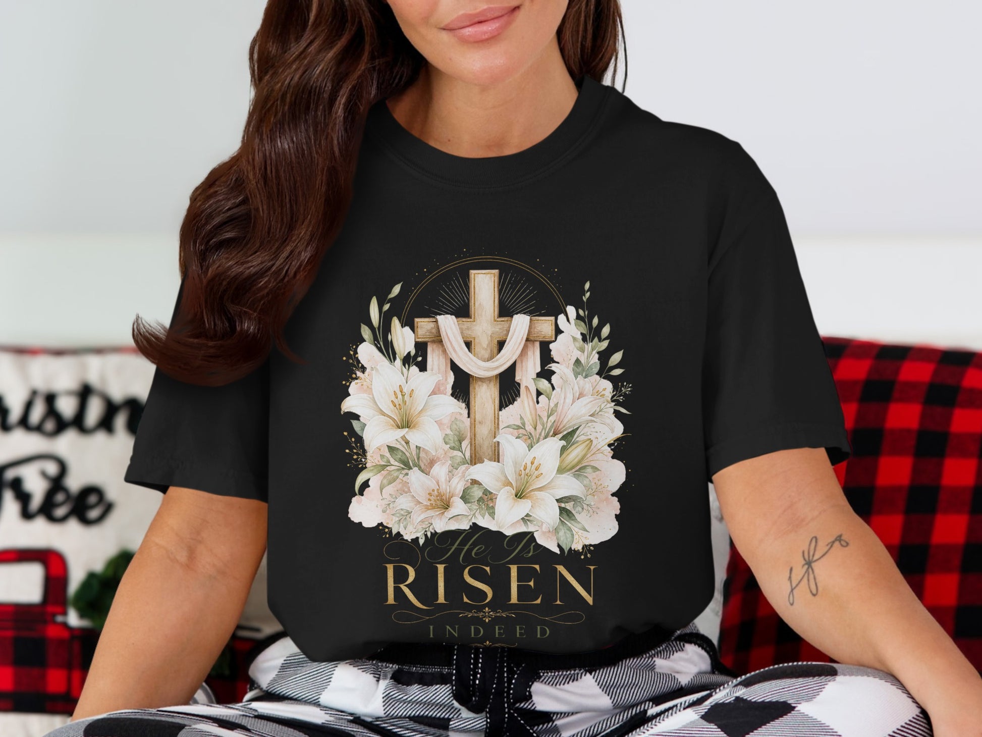 Black t-shirt with a wooden cross, lilies, and "He Is Risen Indeed" text.