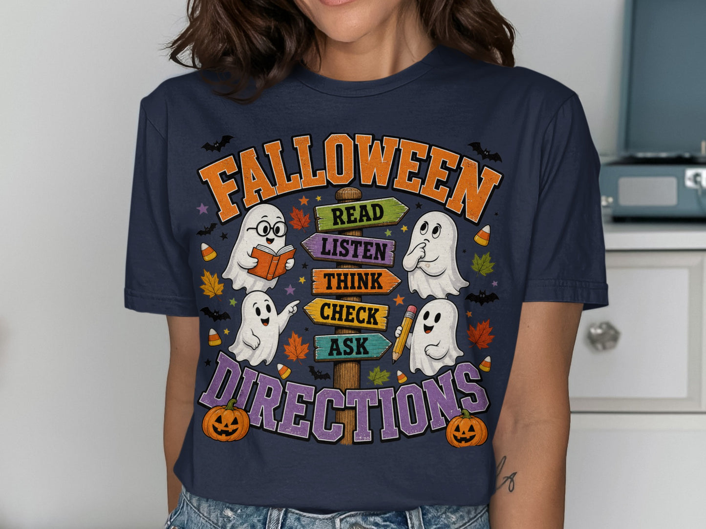 "Falloween" t-shirt with ghosts and directional signs for "Read", "Listen", "Think", "Check", "Ask".