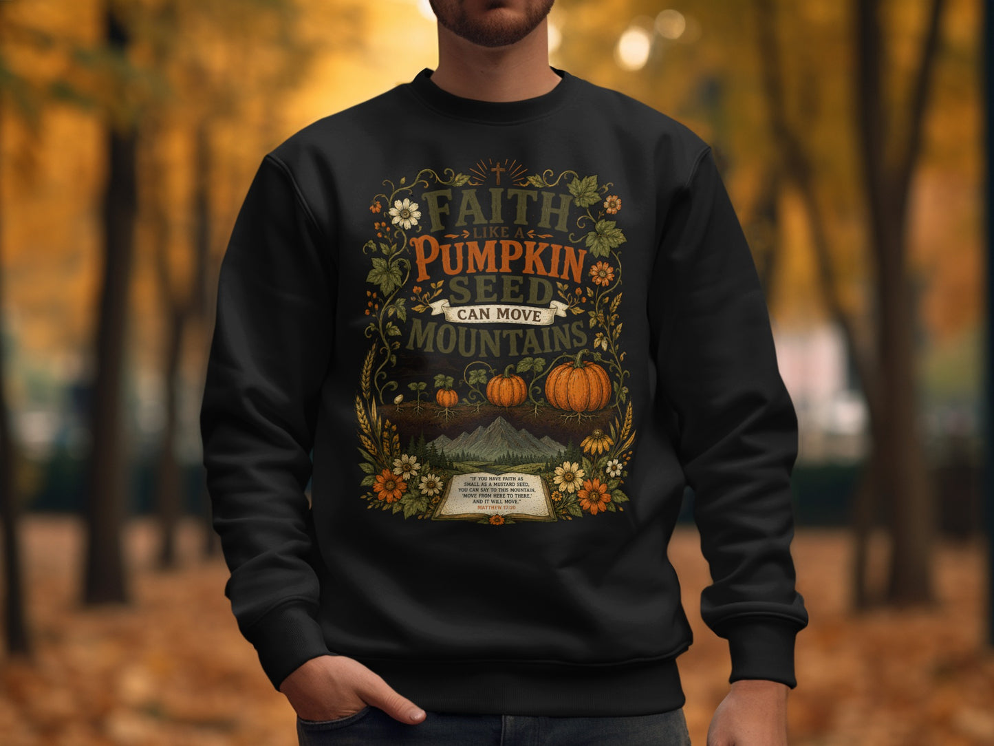 Black sweatshirt with "Faith Like a Pumpkin Seed Can Move Mountains" text and biblical verse.