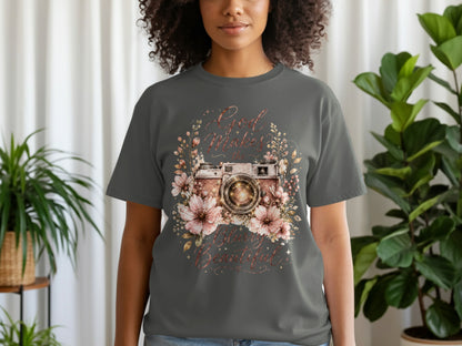 Dark grey t-shirt with floral camera graphic and text "God Makes the Blurry Beautiful."