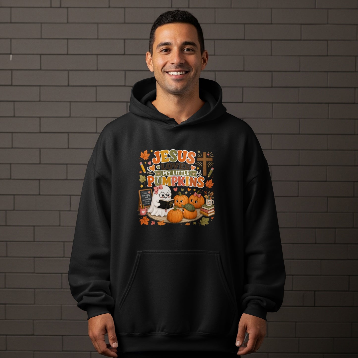Black hoodie with "Jesus Loves My Little Pumpkins" graphic featuring a ghost and pumpkins.