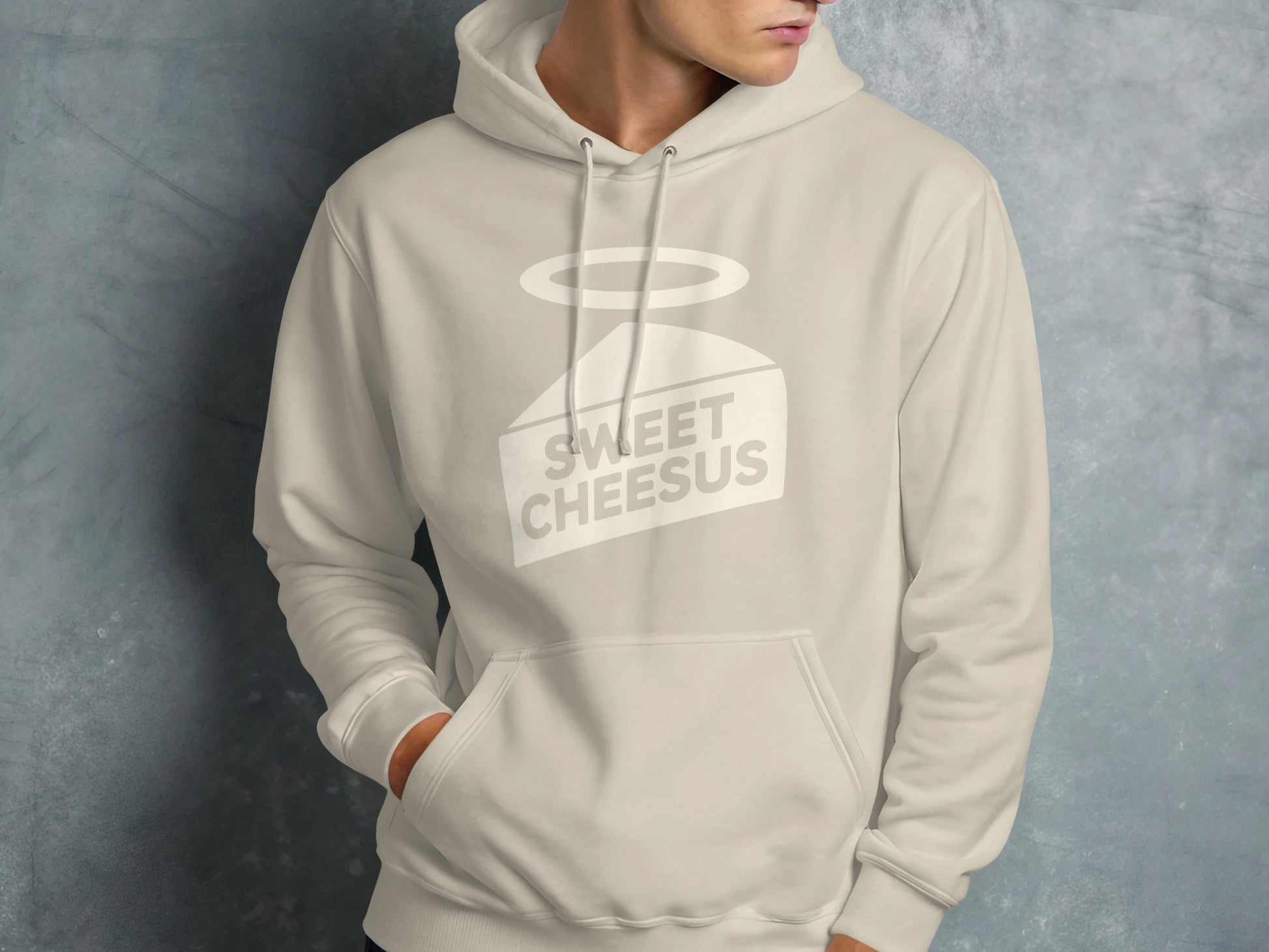 Cream hoodie with "SWEET CHEESUS" text and a cheese wedge graphic.