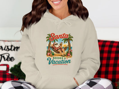 Santa in a hammock on a beach with palm trees, text reads "Santa Needed A Vacation".