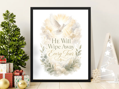 Framed artwork with a dove and text "HE Will Wipe Away Every Tear".