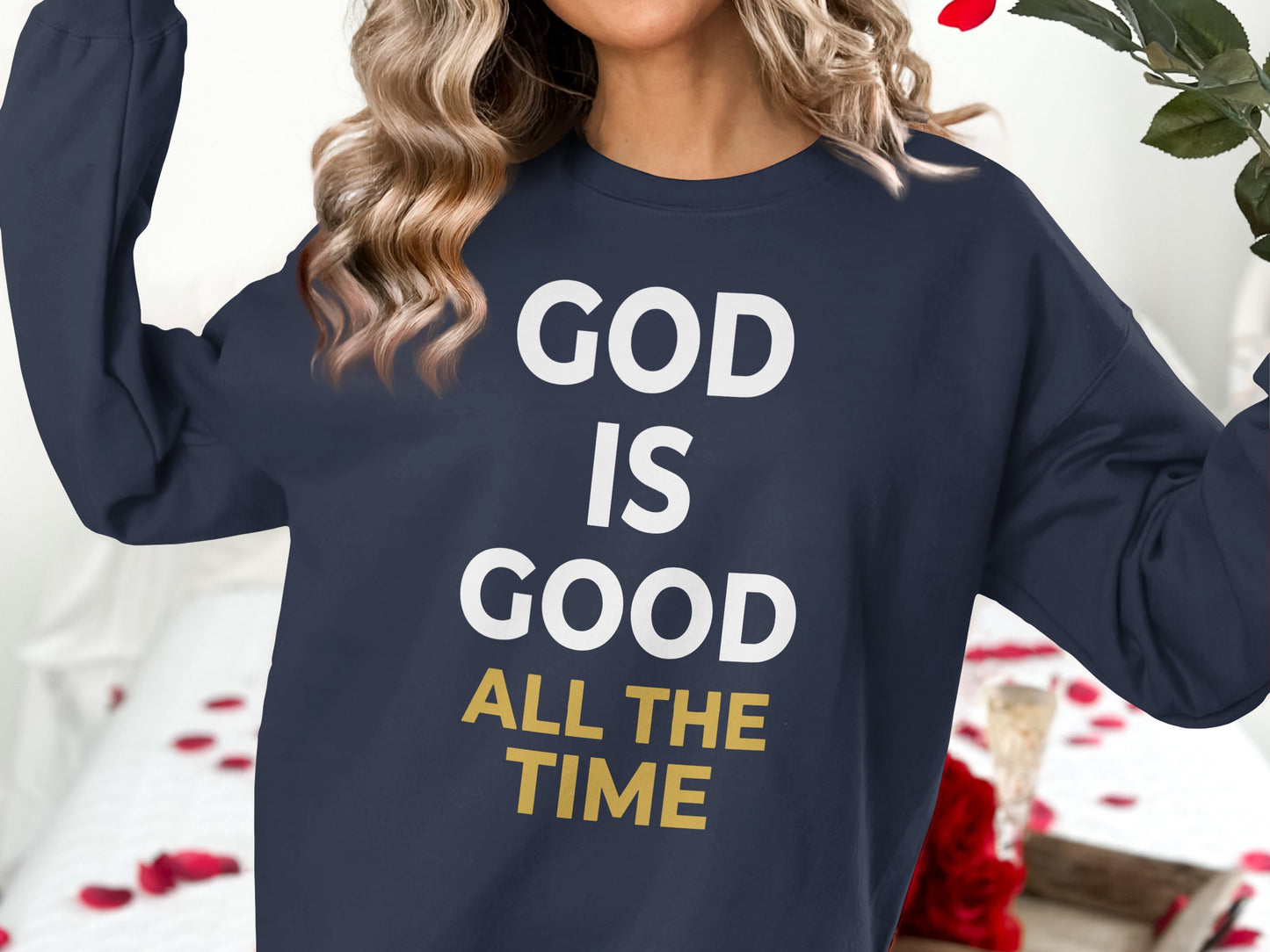 Navy sweatshirt with white and gold text "GOD IS GOOD ALL THE TIME".