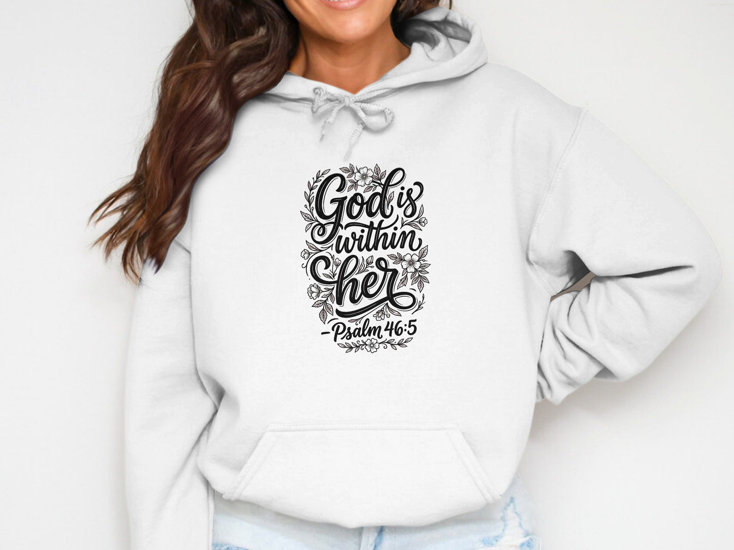 White hoodie with "God is within her Psalm 46:5" floral graphic.