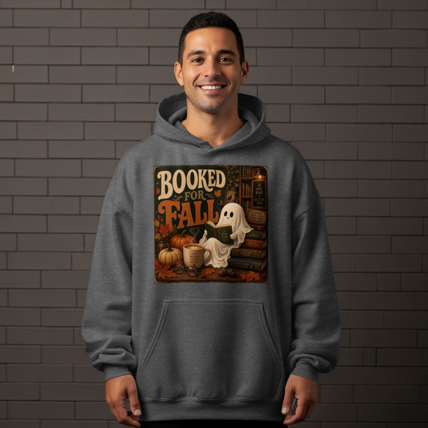 Ghost reading a book with "Booked for Fall" text, pumpkins, and coffee mug.