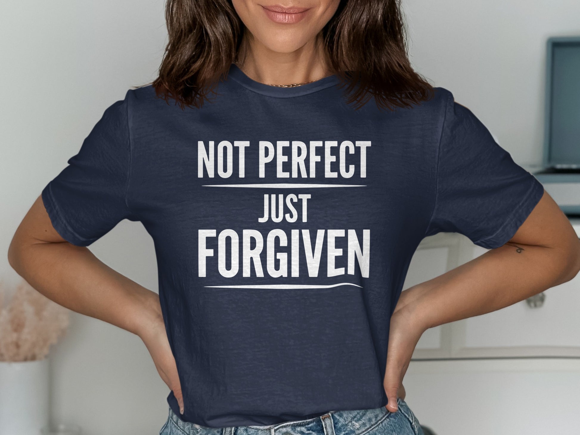 Navy t-shirt with white text "NOT PERFECT JUST FORGIVEN".