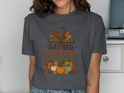 Cross with autumn leaves, pumpkins, and text "GATHER GIVE THANKS PRAY".