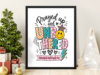 Framed print with text "Prayed up and unbothered because God's got it"