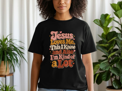 Black t-shirt with "Jesus Loves Me, This I Know and Also I'm Kind of a Lot" text.